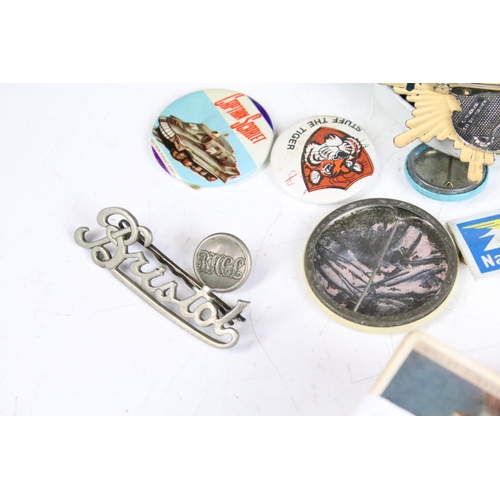 425 - A box of mixed collectables to include cigarette cards, 1960's / 1970's button badges to include The... 