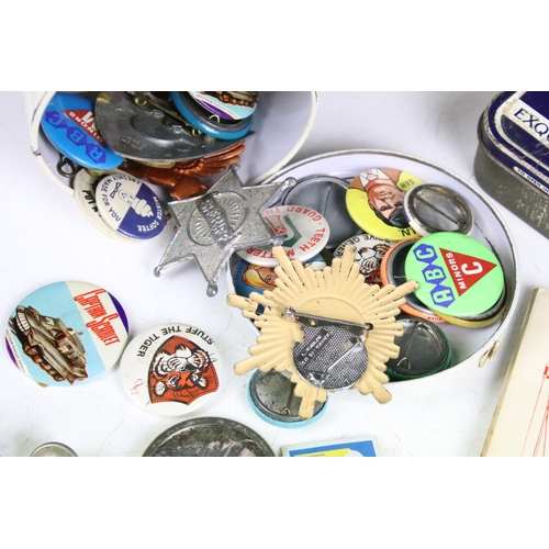 425 - A box of mixed collectables to include cigarette cards, 1960's / 1970's button badges to include The... 