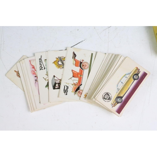 426 - A small collection of cigarette and confectionery cards within albums to include Players & Will's ex... 