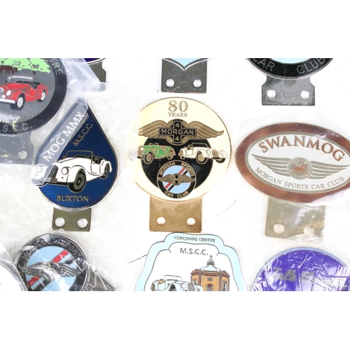 283 - A large collection of Morgan Car Club and associated grill badges to include many enamel examples.