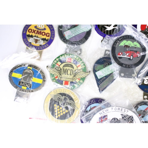 283 - A large collection of Morgan Car Club and associated grill badges to include many enamel examples.