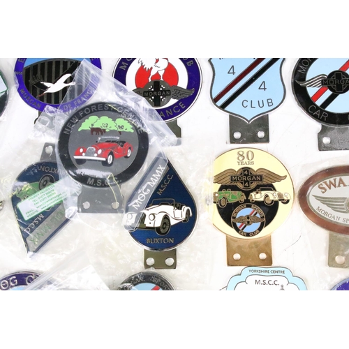 283 - A large collection of Morgan Car Club and associated grill badges to include many enamel examples.