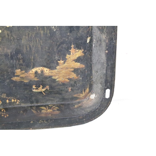 379A - Large Chinoiserie black & gilt lacquered rectangular tray decorated with blossoming trees & pagoda s... 