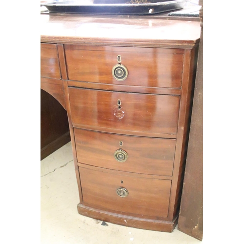 548 - 19th century Bow Front Mahogany Kneehole Desk or Dressing Chest with an arrangement of nine drawers ... 