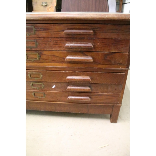 551 - Mid century Oak Plan or Map Chest, the green leather inset top over six drawers with long block hand... 