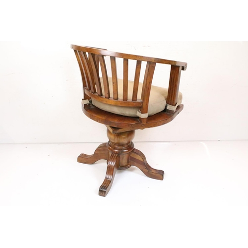 568 - Hardwood Tub Swivel Chair with slat back and substantial bulbous support with four splayed legs, wit... 