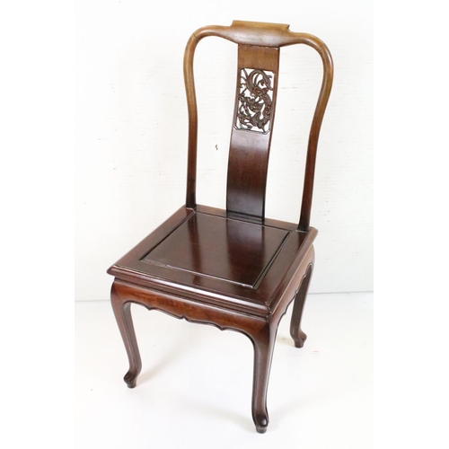 569 - Set of Four Chinese Hardwood Dining Chairs, the pierced splats with dragon design and with solid sea... 