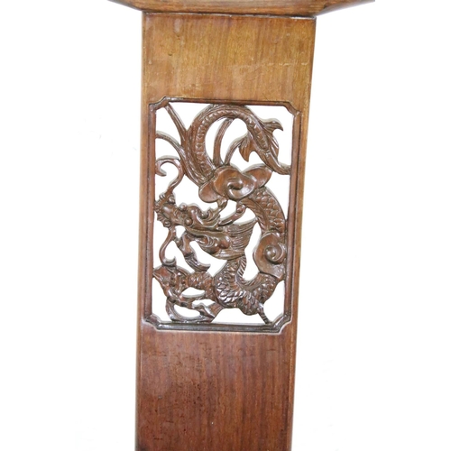 569 - Set of Four Chinese Hardwood Dining Chairs, the pierced splats with dragon design and with solid sea... 