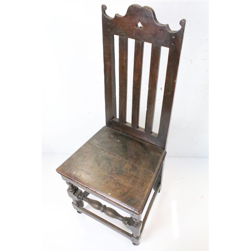 570 - Four similar 17th or 18th century Country Oak Chairs, three with scrolling carved top rails and all ... 