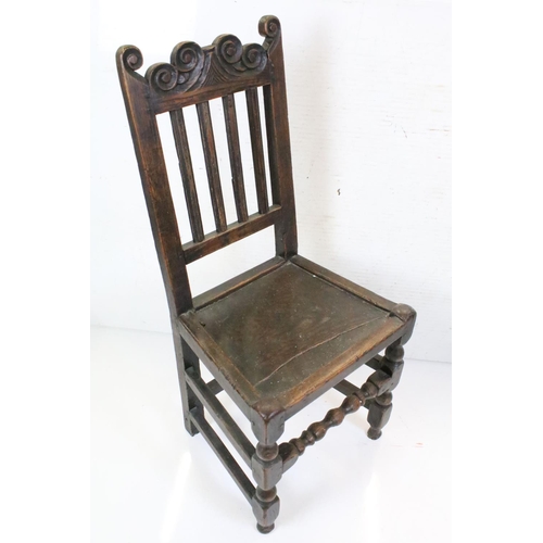 570 - Four similar 17th or 18th century Country Oak Chairs, three with scrolling carved top rails and all ... 