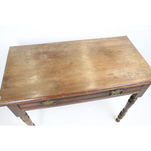 629 - Late 19th / Early 20th century Side Table with single long drawer raised on turned legs, 92cm long x... 