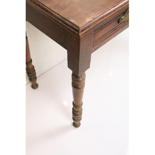 629 - Late 19th / Early 20th century Side Table with single long drawer raised on turned legs, 92cm long x... 