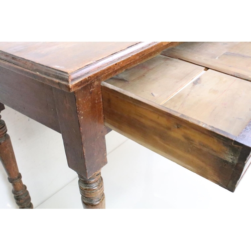 629 - Late 19th / Early 20th century Side Table with single long drawer raised on turned legs, 92cm long x... 