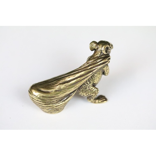 196 - A Chinese ornamental Solid brass lucky fortune rat with character marks to bag, measures approx 6cm ... 