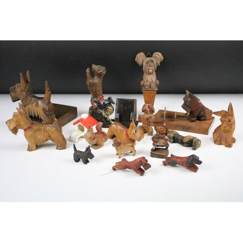 289 - A collection of carved wooden dog ornaments to include a good selection of Scottie / Scotts terriers... 