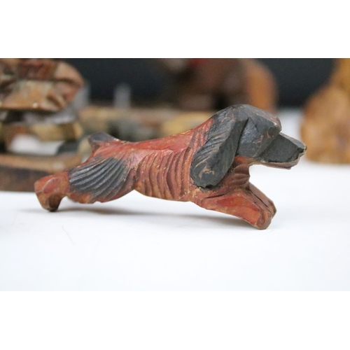 289 - A collection of carved wooden dog ornaments to include a good selection of Scottie / Scotts terriers... 