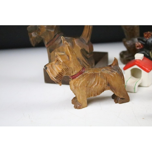 289 - A collection of carved wooden dog ornaments to include a good selection of Scottie / Scotts terriers... 