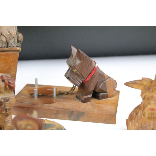 289 - A collection of carved wooden dog ornaments to include a good selection of Scottie / Scotts terriers... 