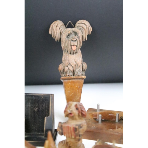 289 - A collection of carved wooden dog ornaments to include a good selection of Scottie / Scotts terriers... 