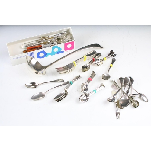 293 - A collection of cutlery to include hallmarked sterling silver teaspoons, silver coffee spoons and a ... 