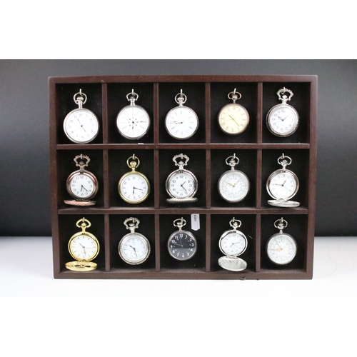 300 - A collection of fifteen contemporary pocket watches contained within a wooden wall mounted display c... 