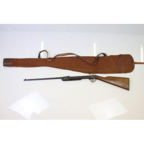 305 - A vintage Tell air rifle together with rifle bag.