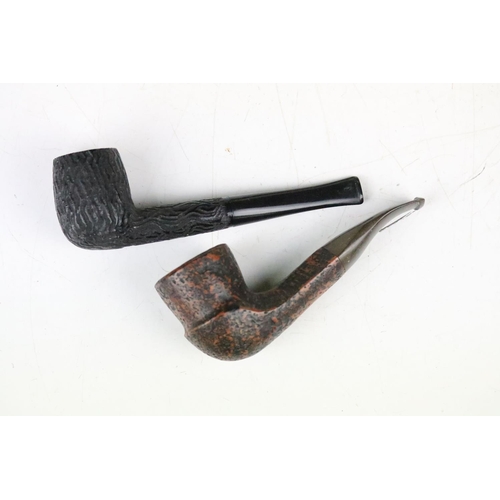 310 - A collection of boxed and unboxed smokers pipes to include Charatan examples together with a Wade ce... 