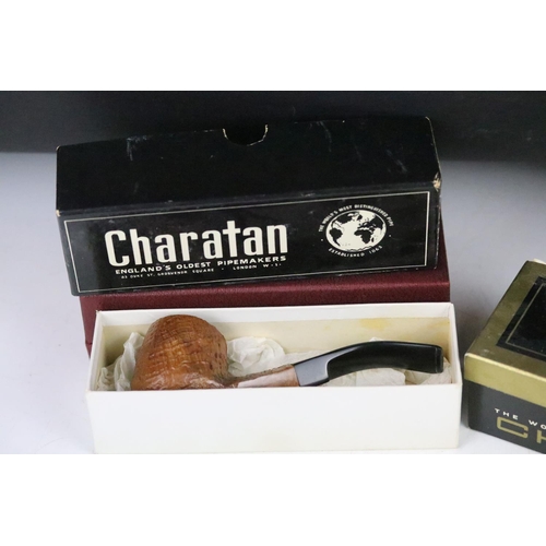 310 - A collection of boxed and unboxed smokers pipes to include Charatan examples together with a Wade ce... 