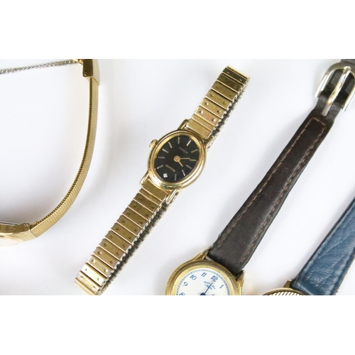 329 - A collection of ladies and gents wristwatches to include Seiko and Rotary examples.