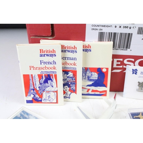 330 - A group of British Airways collectables to include badges, models, cards, games, spoons, books....et... 