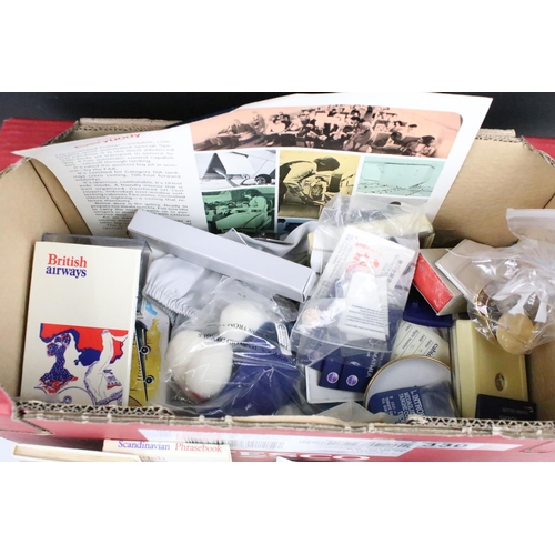 330 - A group of British Airways collectables to include badges, models, cards, games, spoons, books....et... 