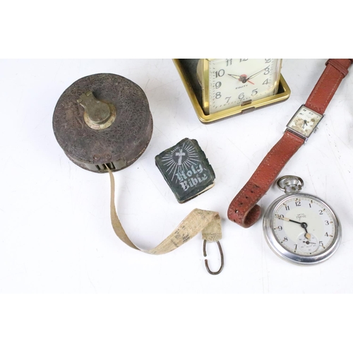 332 - A small group of mixed collectables to include wristwatches, pocket watches, travel clock, cigarette... 