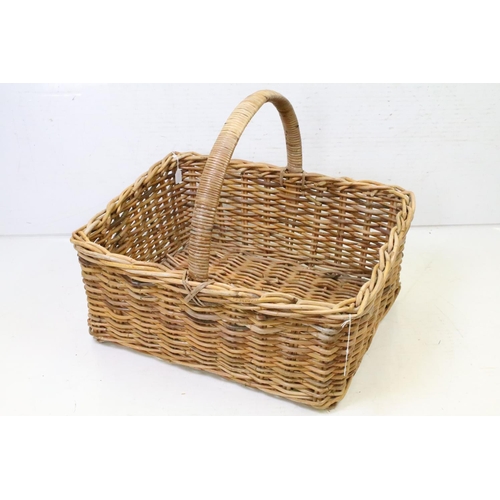 349 - Large rectangular wicker log basket with loop carry handle, approx 61cm long