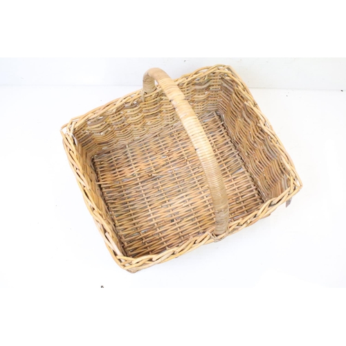 349 - Large rectangular wicker log basket with loop carry handle, approx 61cm long