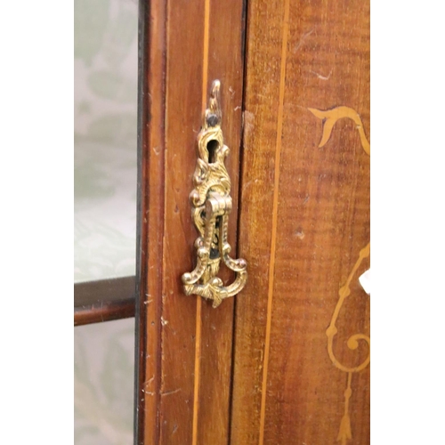 557 - Edwardian Mahogany Inlaid Display Cabinet, the two doors opening to a pale green fabric lined interi... 