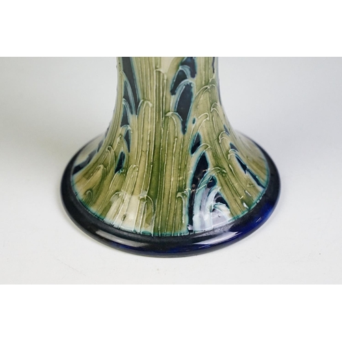 15 - William Moorcroft for Macintyre Florian ware inverted baluster vase, with tubelined blue, green & ye... 