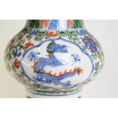 16 - Chinese porcelain gu vase having blue underglaze detailing featuring a dragon with green, red and ye... 