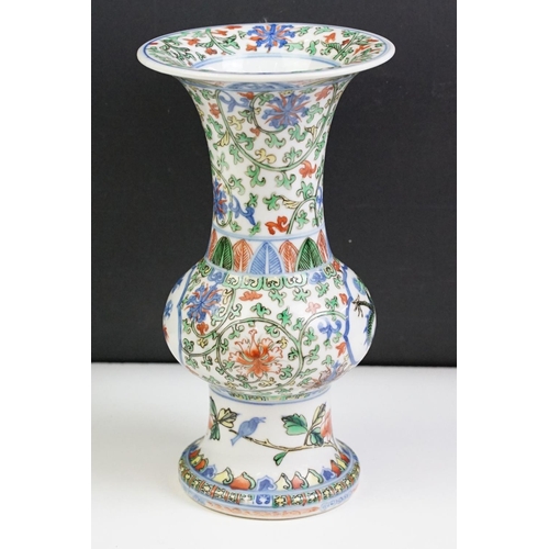 16 - Chinese porcelain gu vase having blue underglaze detailing featuring a dragon with green, red and ye... 