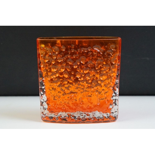 18 - Whitefriars tangerine nail head glass vase of square form. Measures 11.5cm tall.