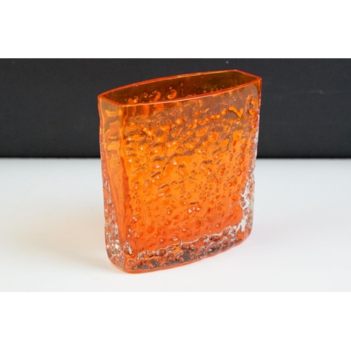 18 - Whitefriars tangerine nail head glass vase of square form. Measures 11.5cm tall.