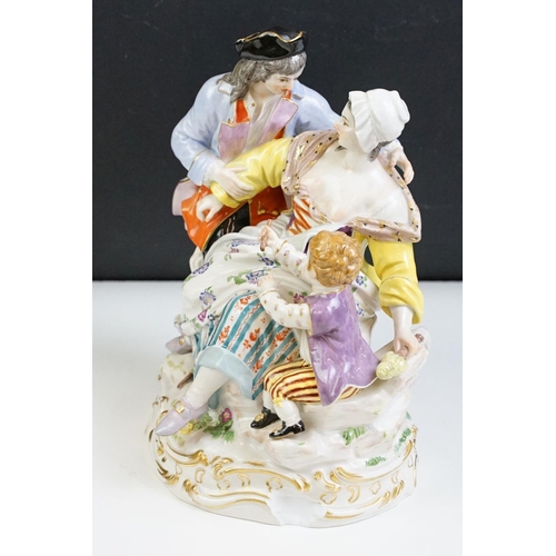 21 - 1920s German Meissen ceramic figurine group featuring a couple and child with hand painted detailing... 