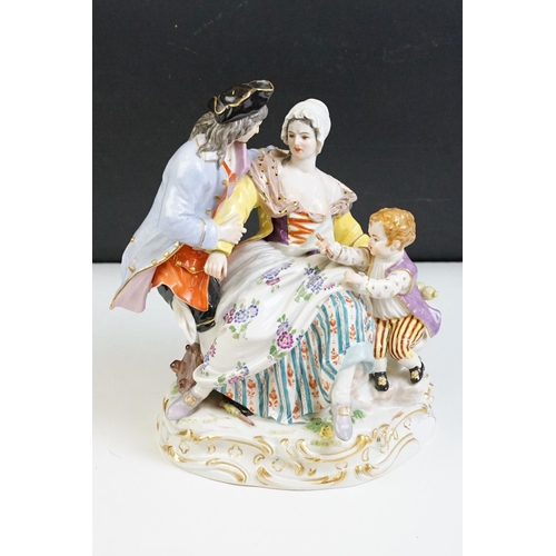 21 - 1920s German Meissen ceramic figurine group featuring a couple and child with hand painted detailing... 