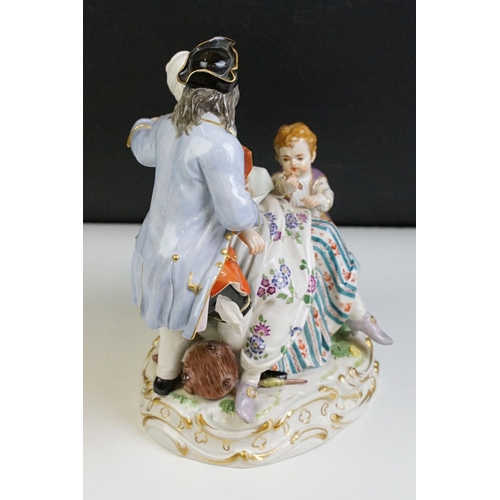 21 - 1920s German Meissen ceramic figurine group featuring a couple and child with hand painted detailing... 