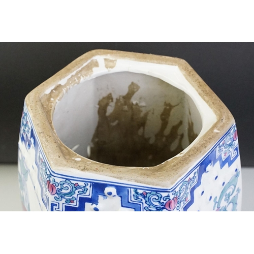 27 - Chinese ceramic stool of hexagonal barrel form having transfer printed panels depicting florals and ... 