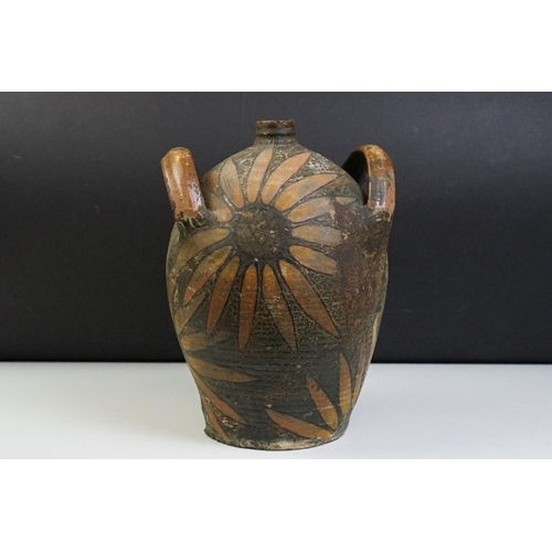 37 - Earthenware Oil Jar with sunflower design, signed to the body