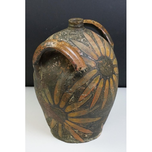 37 - Earthenware Oil Jar with sunflower design, signed to the body