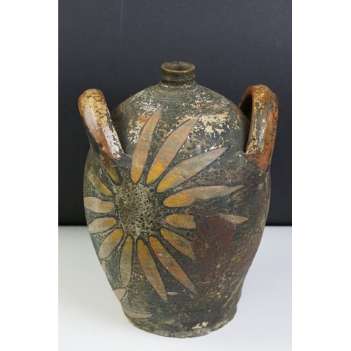 37 - Earthenware Oil Jar with sunflower design, signed to the body