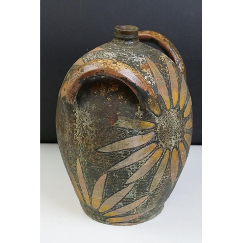 37 - Earthenware Oil Jar with sunflower design, signed to the body