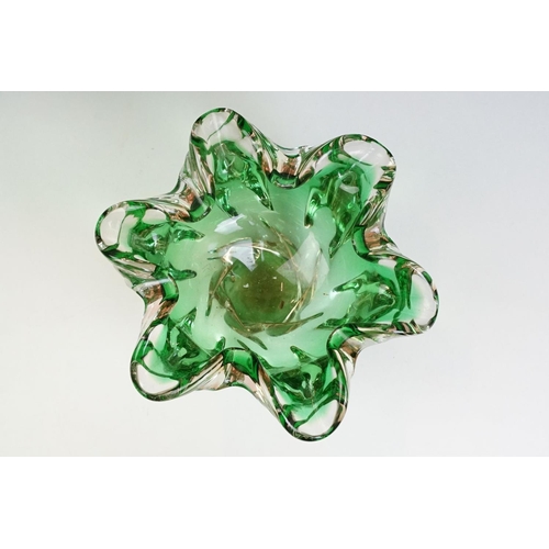 49 - Two pieces of mid Century Czech green glass bowls to include a lobed bowl and fanned rim footed bowl... 