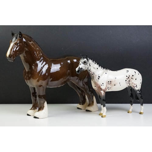 51 - Two Beswick horses to include a white footed shire horse together with a black and white appaloosa s... 